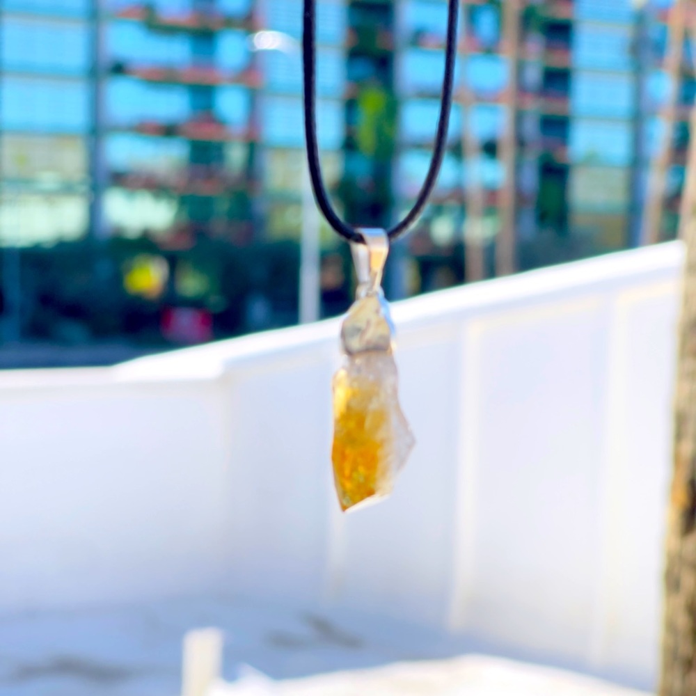 Rough citrine pendants with silver fitting. Two sizes 10 in long or 13 in long